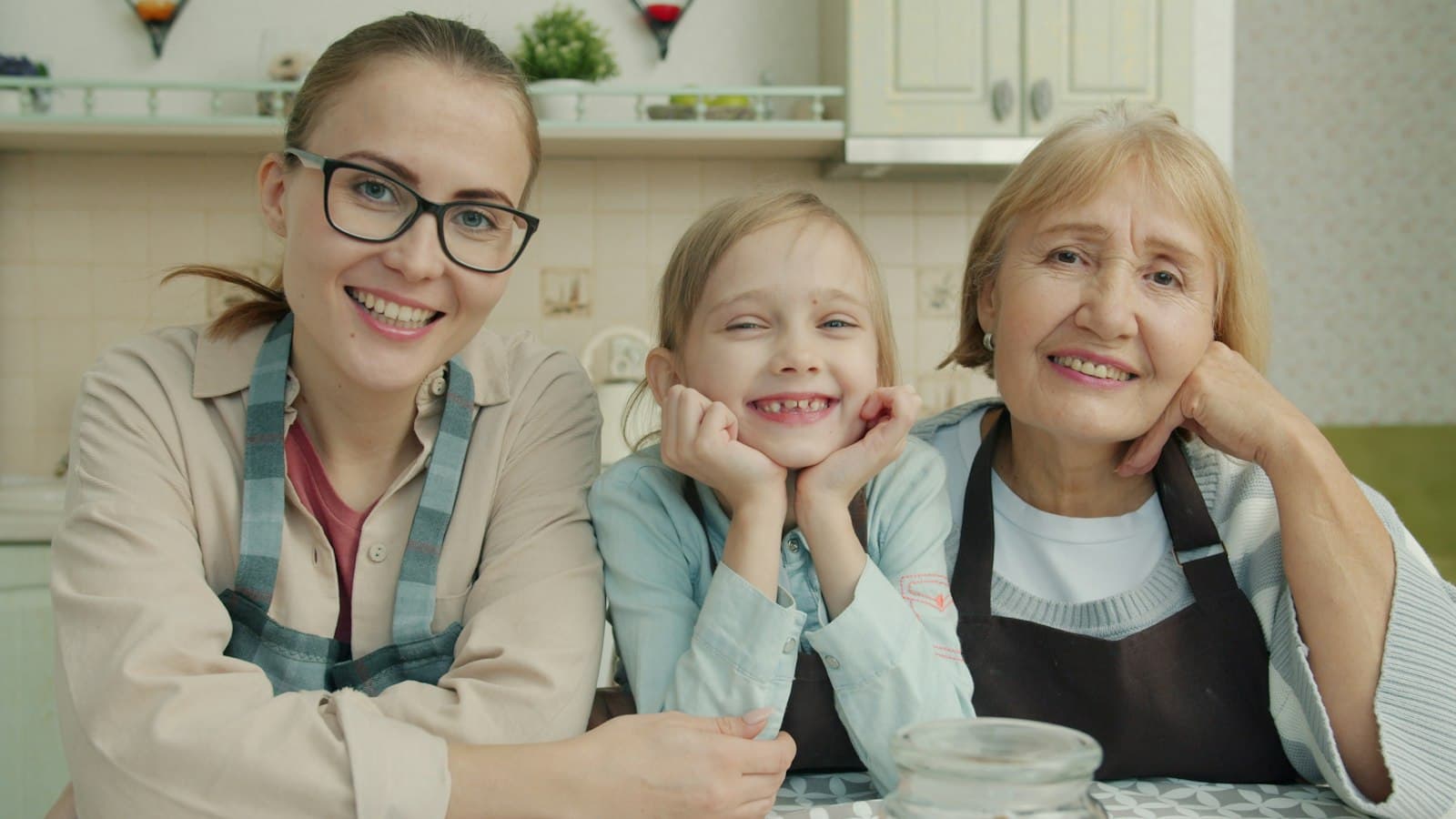 Three generations of a family together in their kitchen